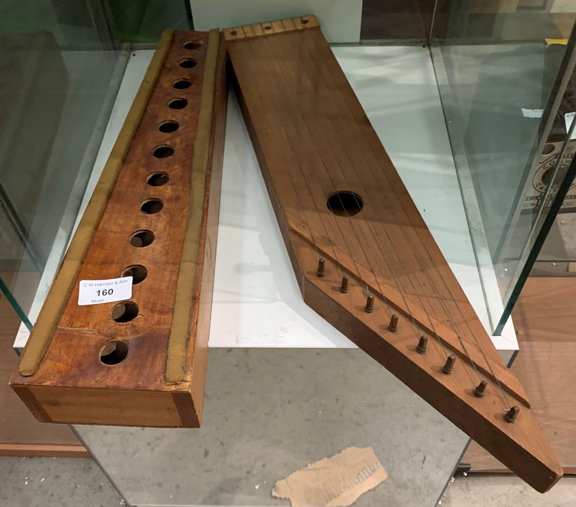 Two wooden string musical instruments