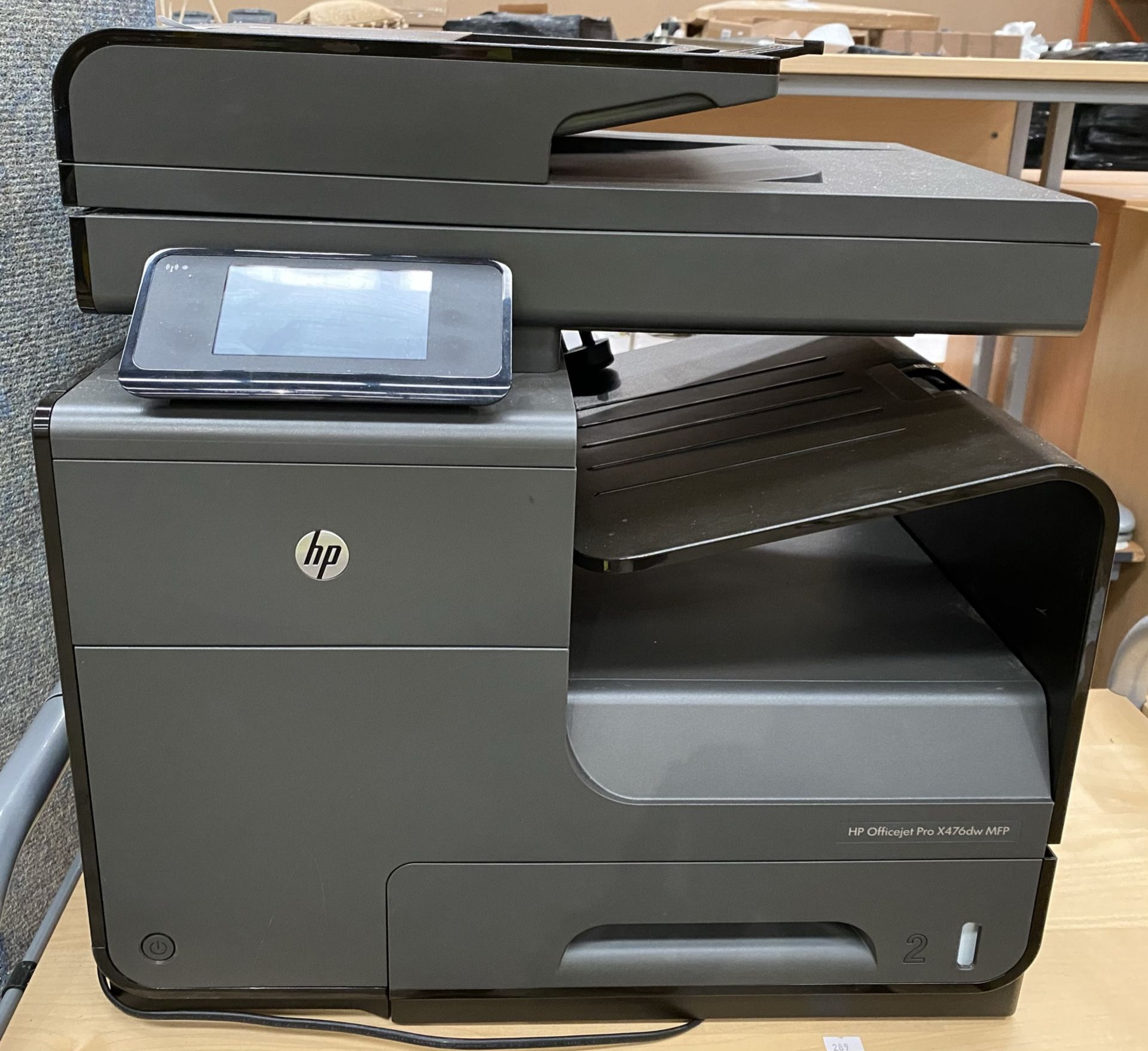 An HP OfficeJet Pro X476dw mfp printer