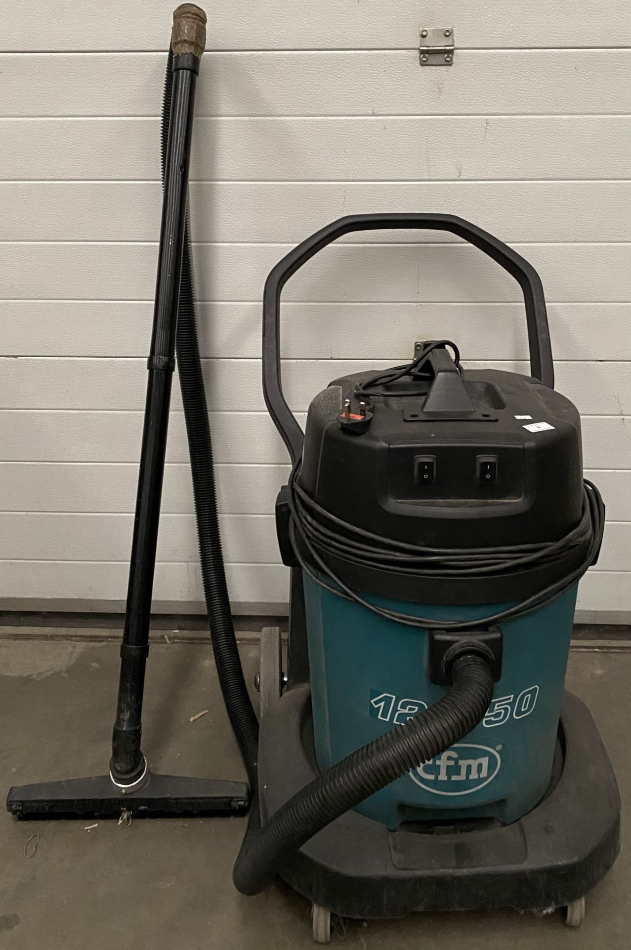 A CFM 124/50 GWD350-2 portable vacuum cleaner c/w hose and brush