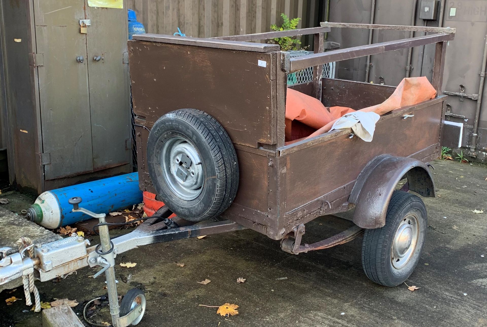 A single axle wood framed trailer,