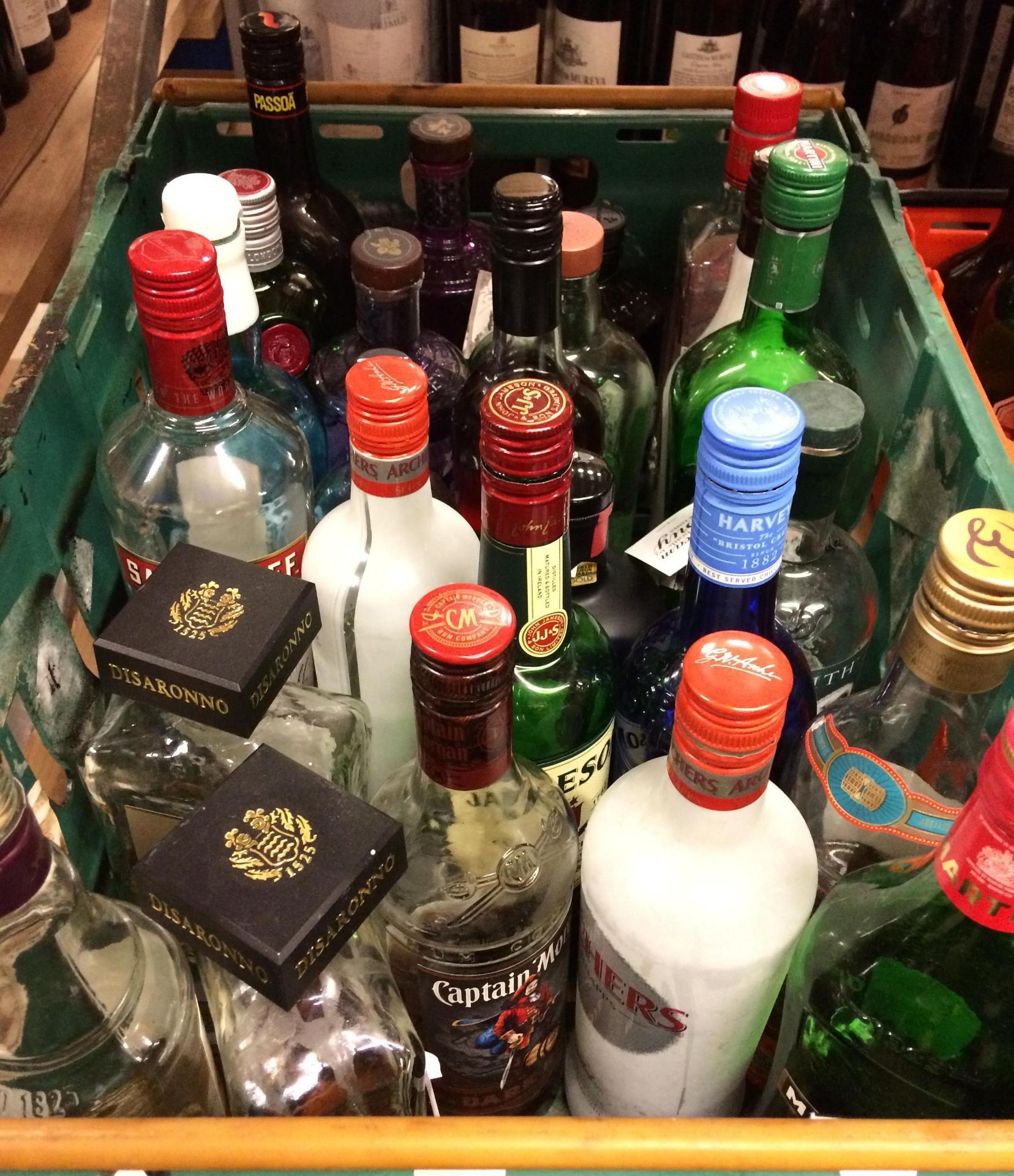 25 x assorted part bottles including gin, rum, vodka, Disaronna,