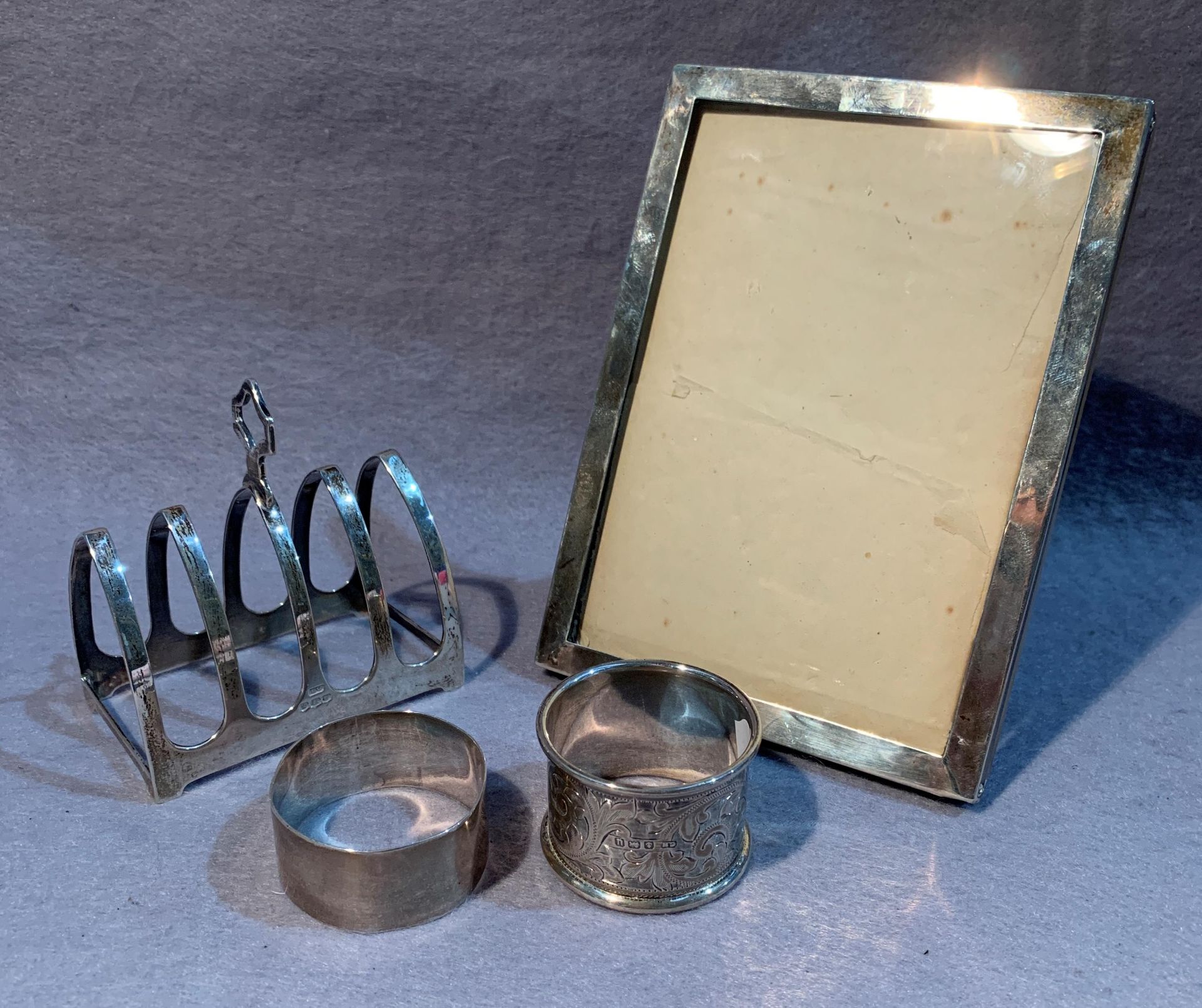 A silver photograph frame, a silver four division toast rack, - Image 2 of 3