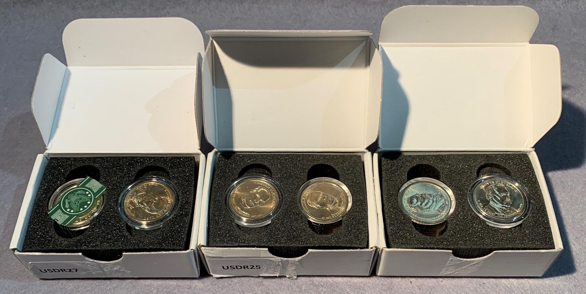 Three boxed sets of Danbury Mint Presidential dollars,