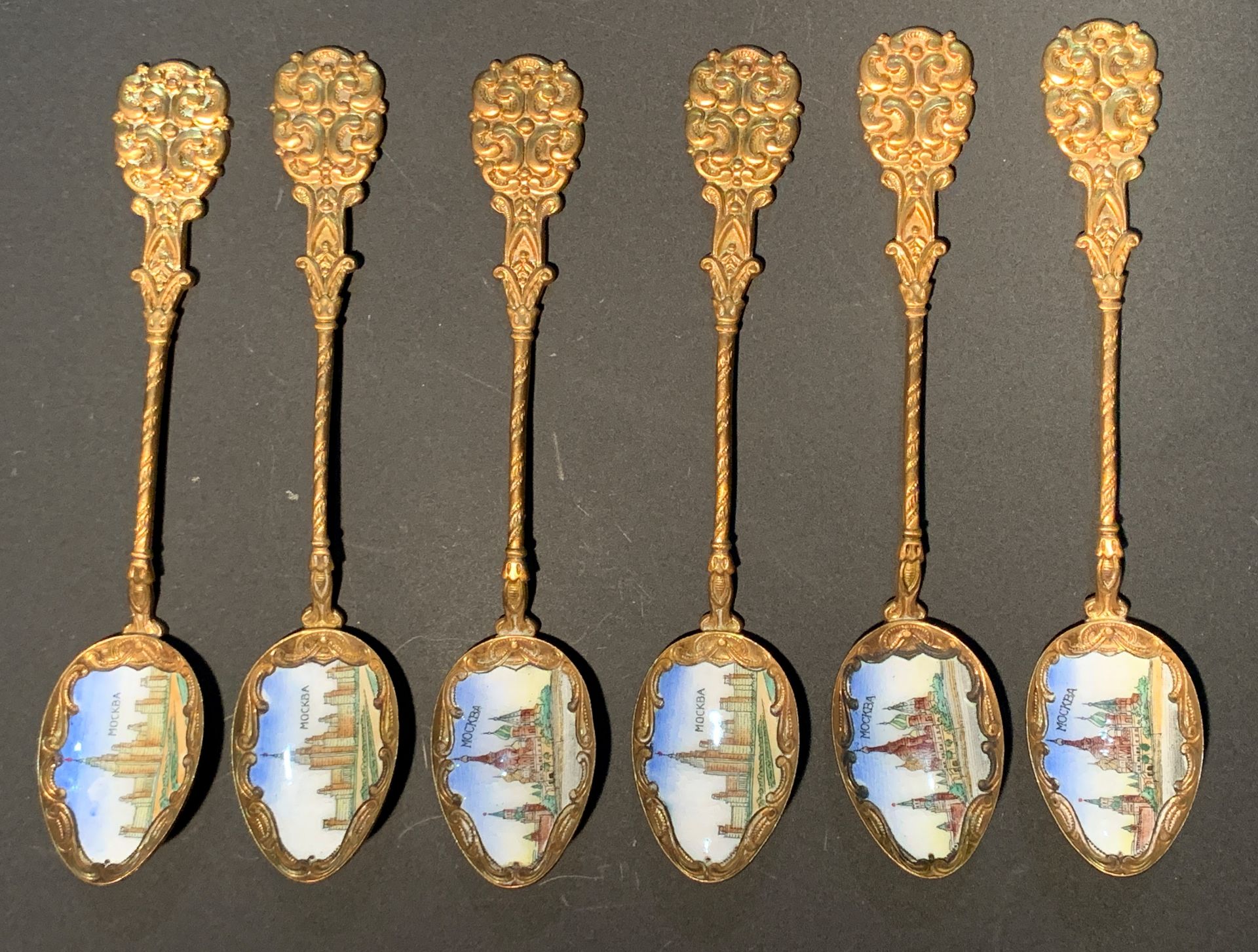 Six gilt and enamel engraved Russian spoons