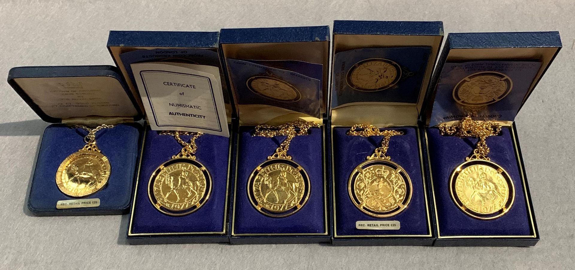 Five Crown of Crown gold plated coin pendants (boxed)