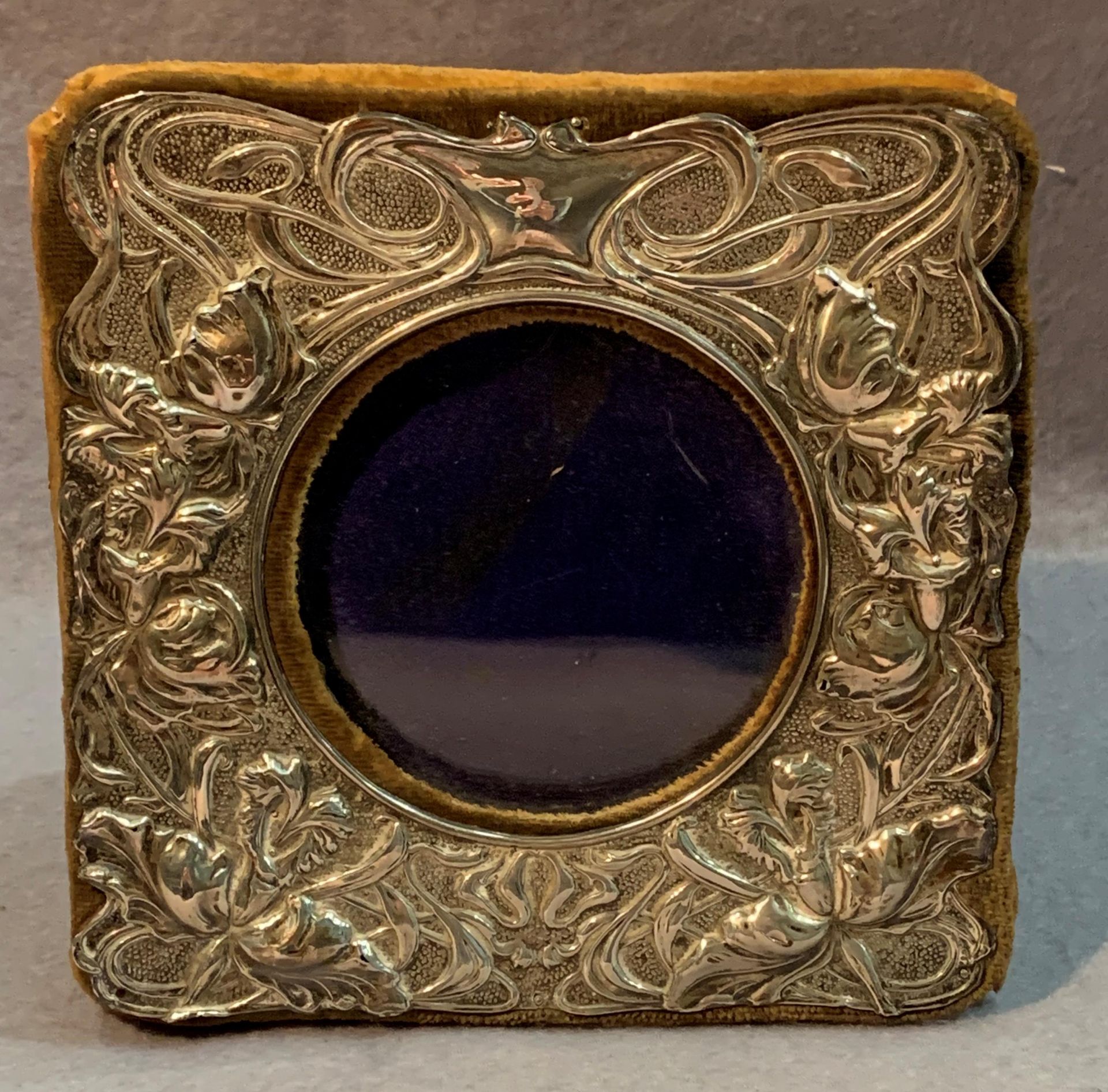 A silver Art Nouveau style photograph frame,