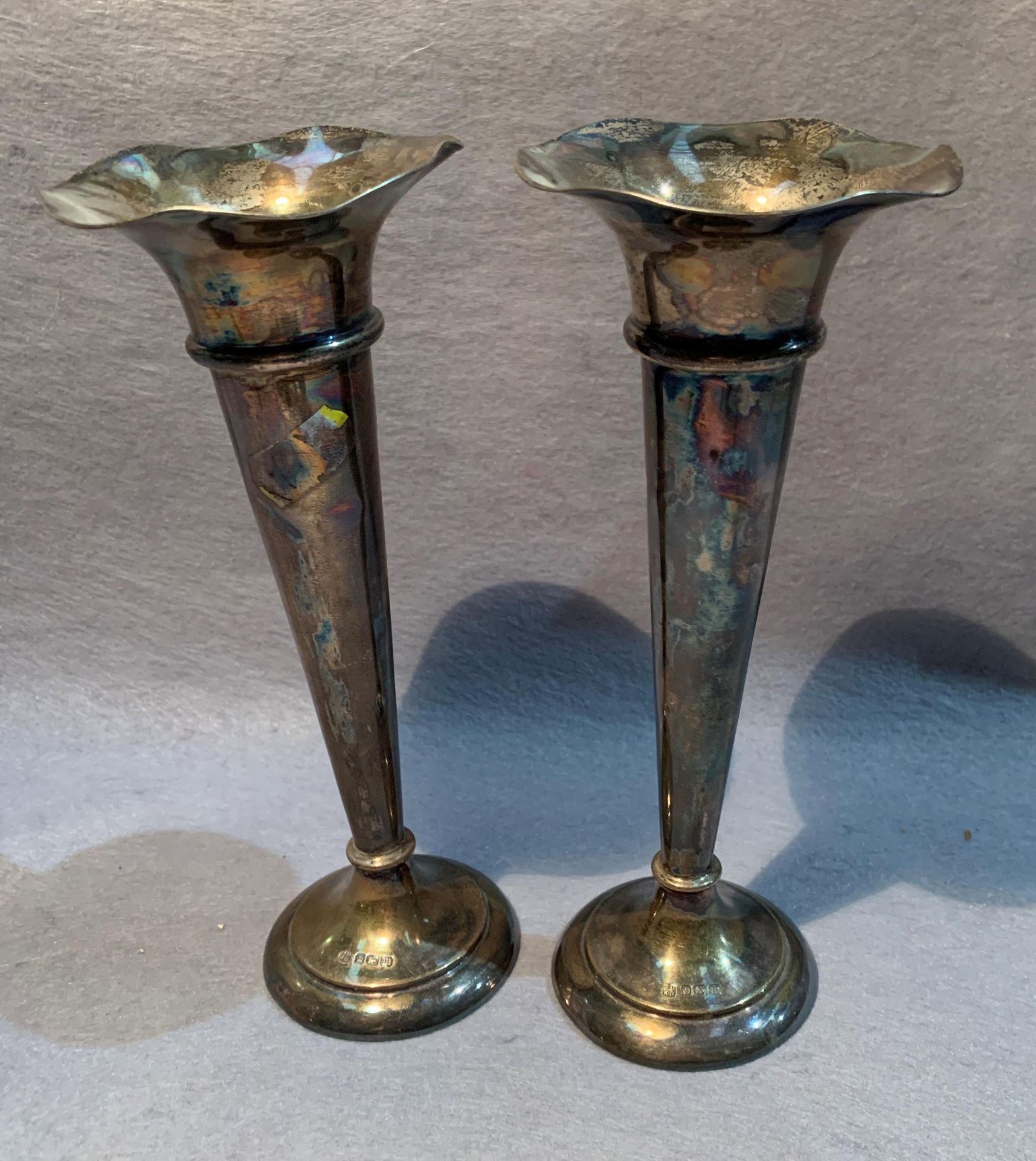 A pair of silver trumpet vases, each 20cm high, loaded bases, total approximate overall weight 7.