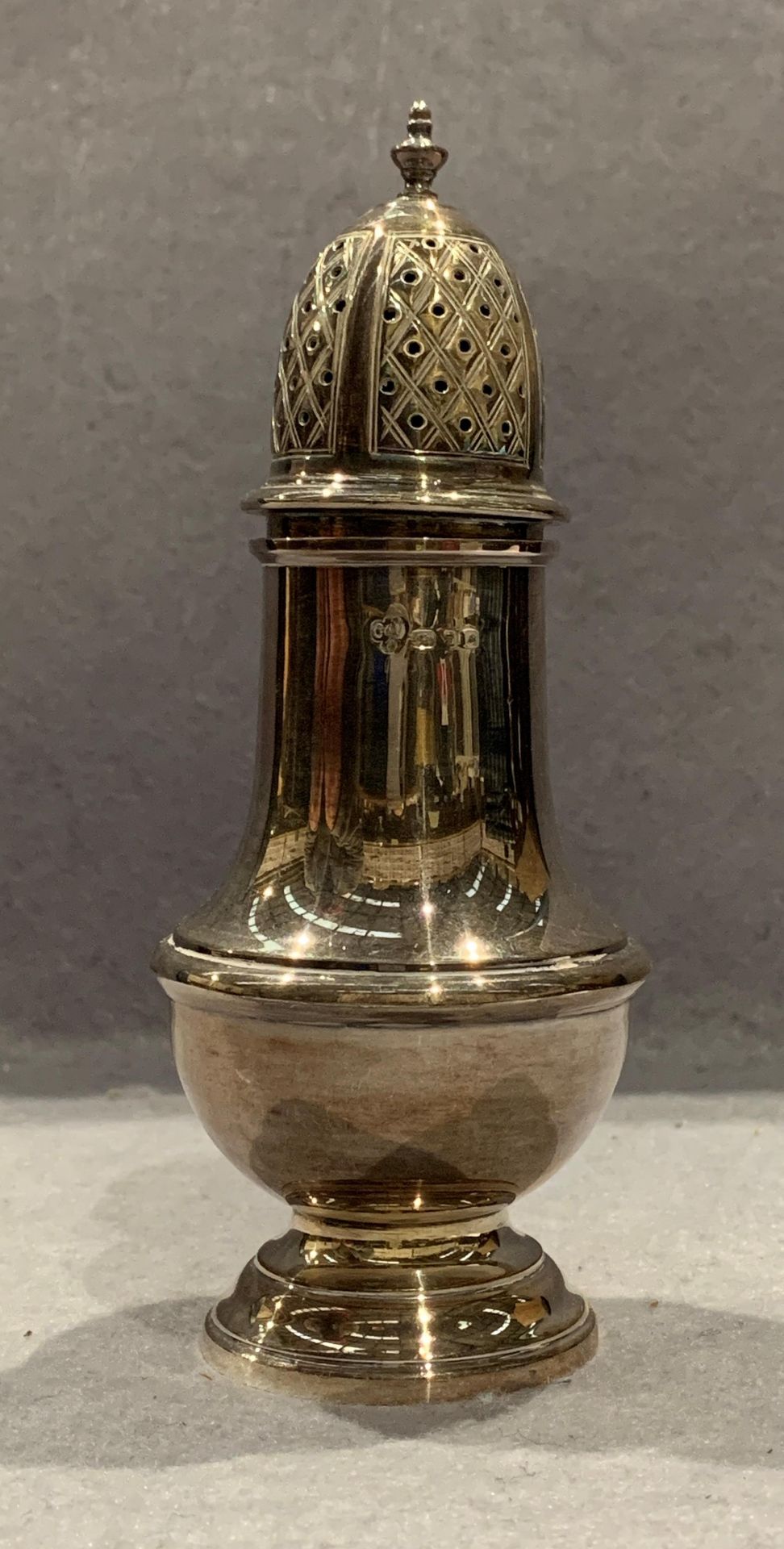 A silver sugar caster, approximate weight 4.