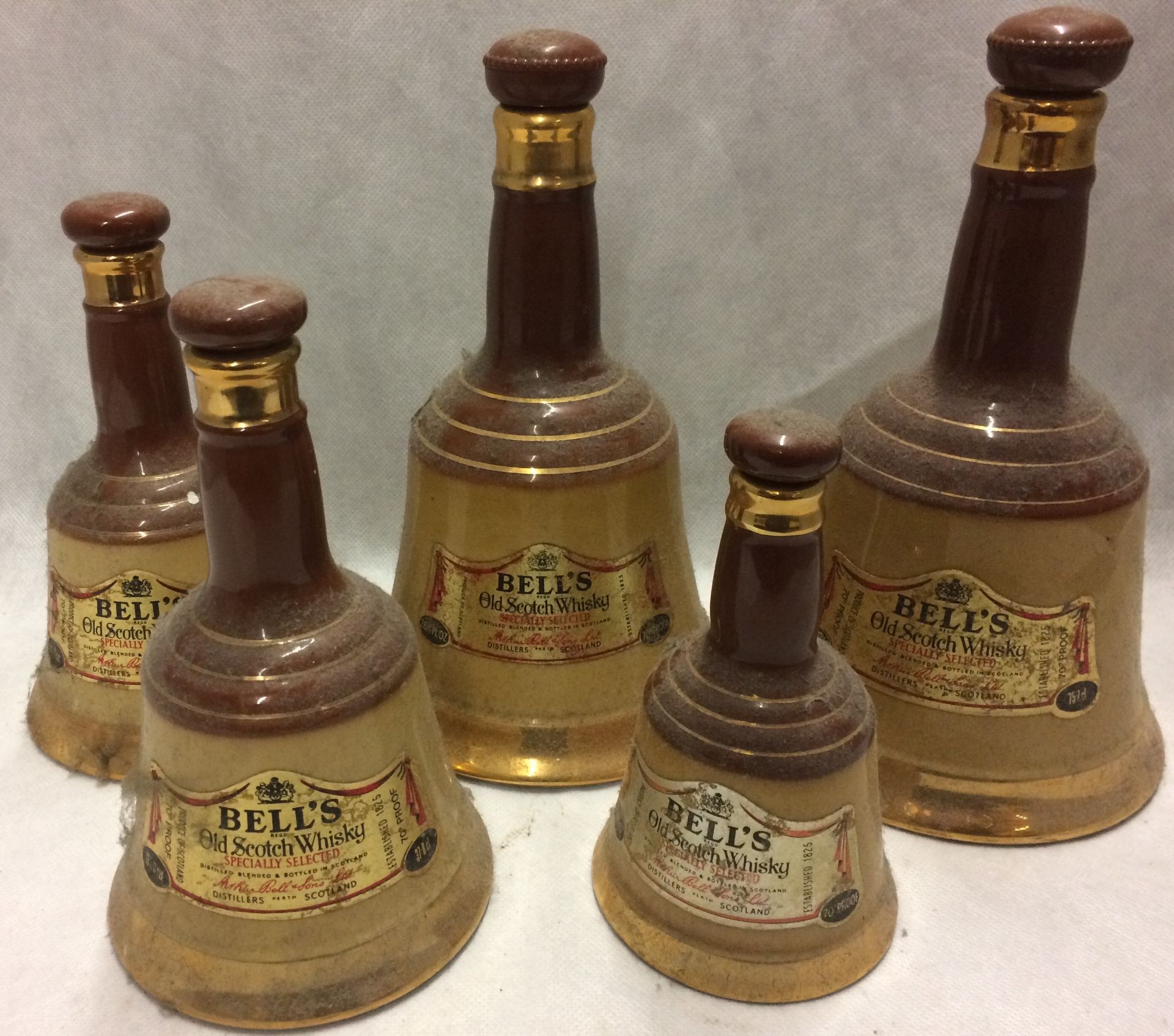 5 x assorted sized Wade porcelain Bell's Old Scotch whisky decanters - no contents