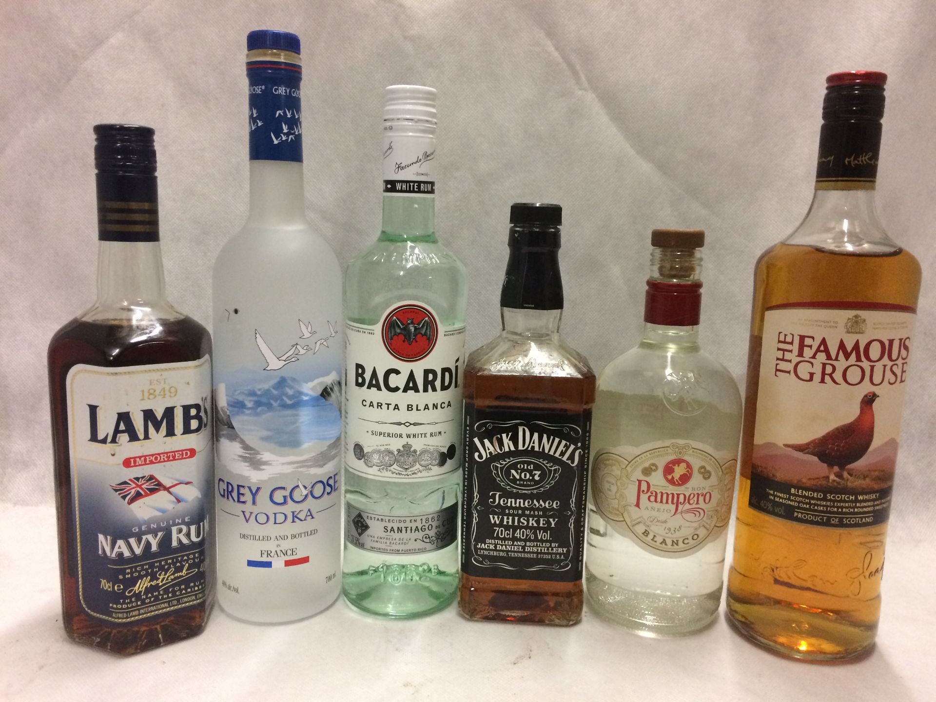 6 x bottles of assorted spirits - Famous