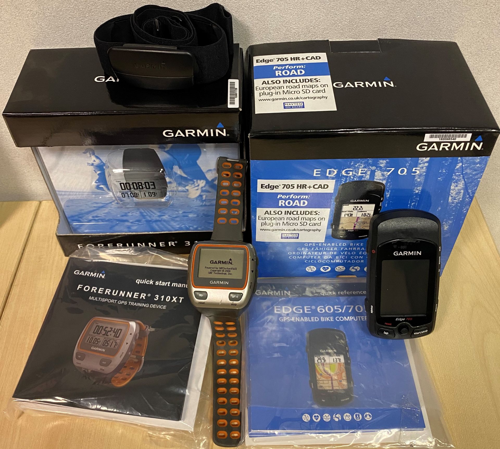 2 x Garmin units - a Garmin Forerunner 310XT multisport/triathlon watch and a Garmin Edge 705