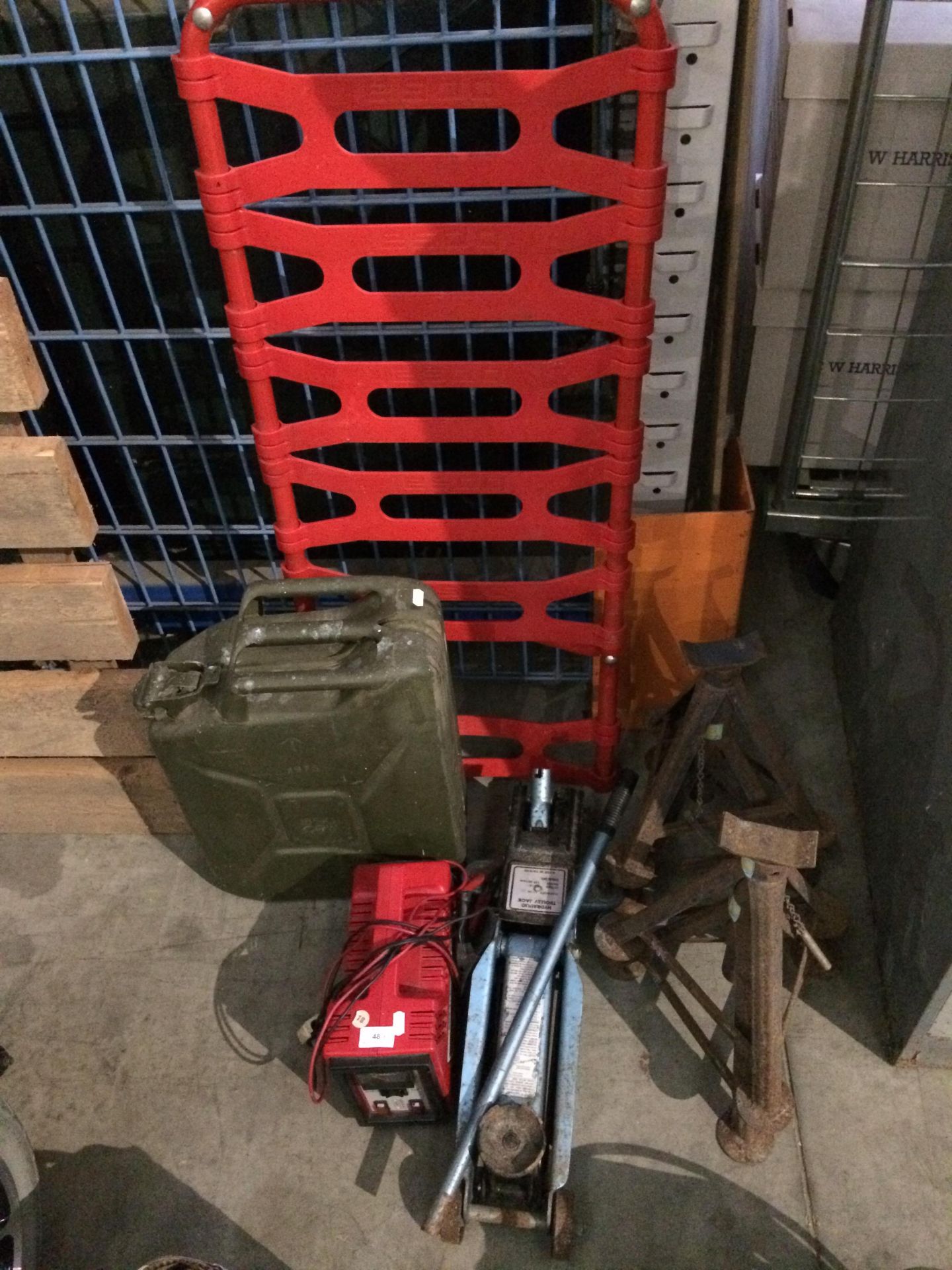 4 x axle stands (2 x incomplete), 2 tonne hydraulic trolley jack, Radex 12 volt starter charger,