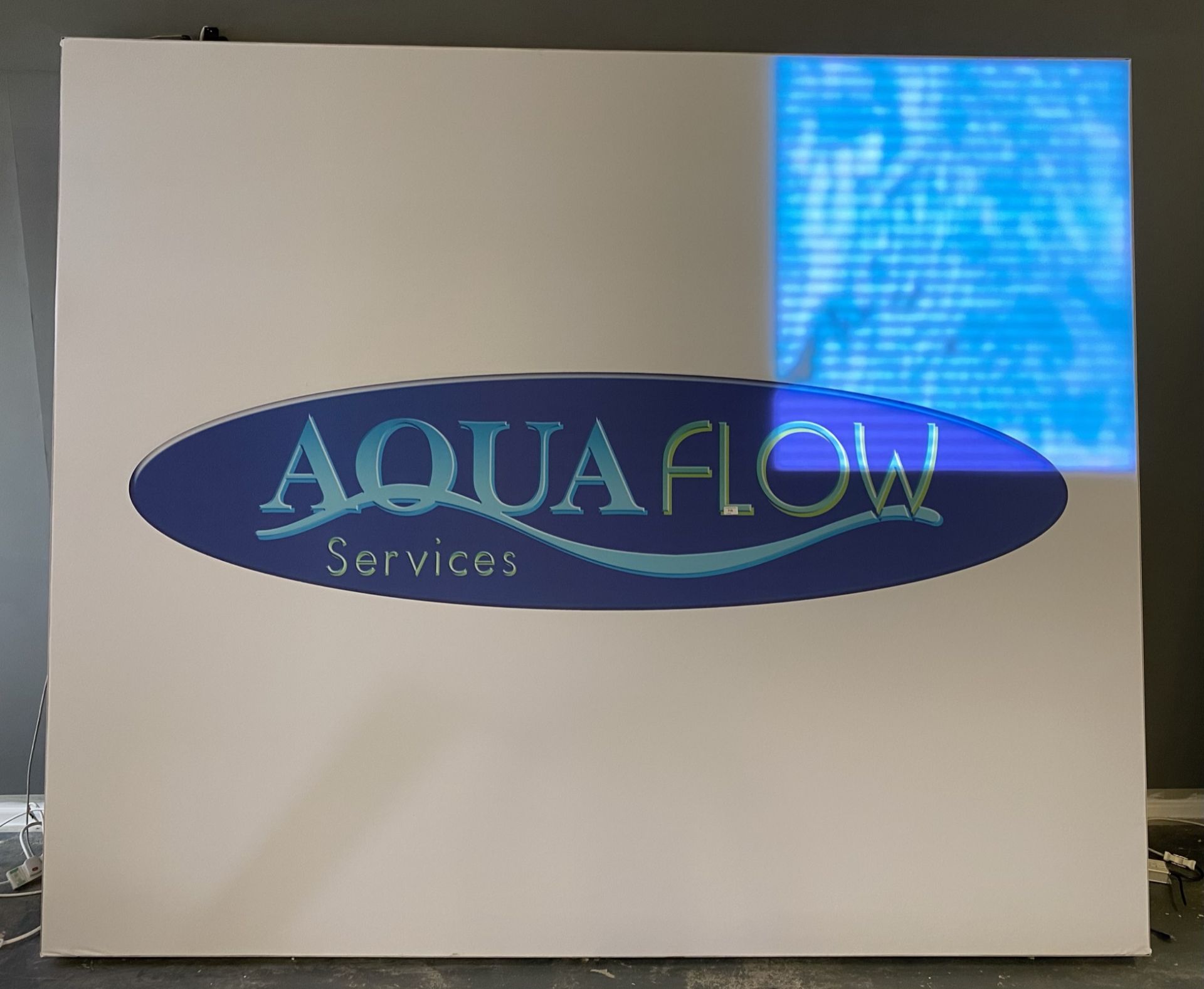 A large photographic rectangular illuminated light box with Aqua Flow Services logo - 245cm x 290cm - Image 2 of 2