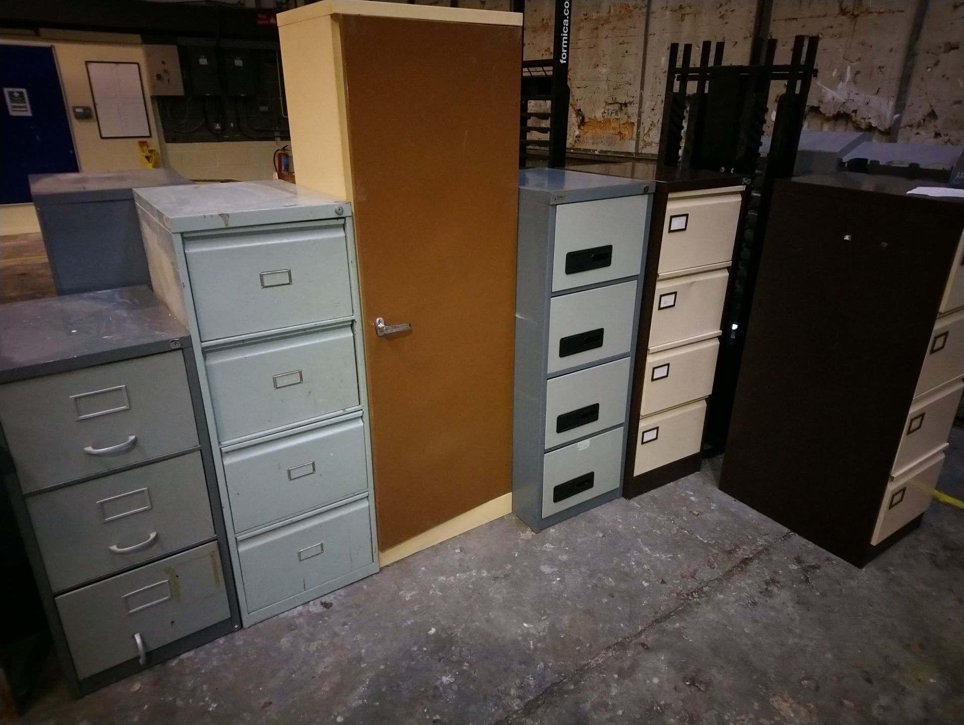 6 metal filing cabinets and sample stands