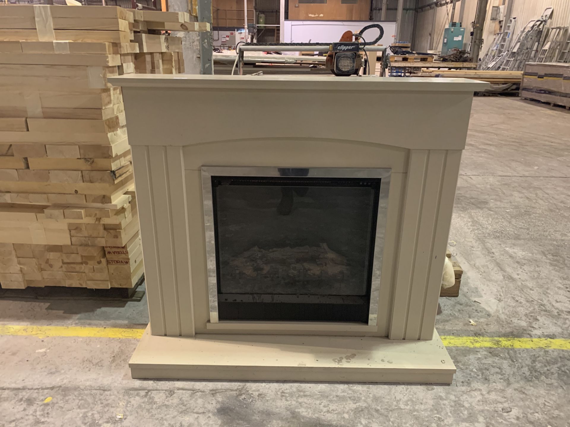 Electric fireplace and spare surround