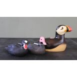 Two hand carved and painted Ducks (Pink Headed and Scoter) with a Puffin