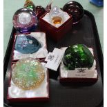 Boxed and unboxed Royal Crest and other glass paperweights