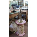 A pink ground pottery stand plus a lady table lamp