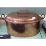 A Victorian twin handled oval copper fish kettle with cover and strainer,