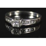 An 18ct white gold solitaire diamond ring,