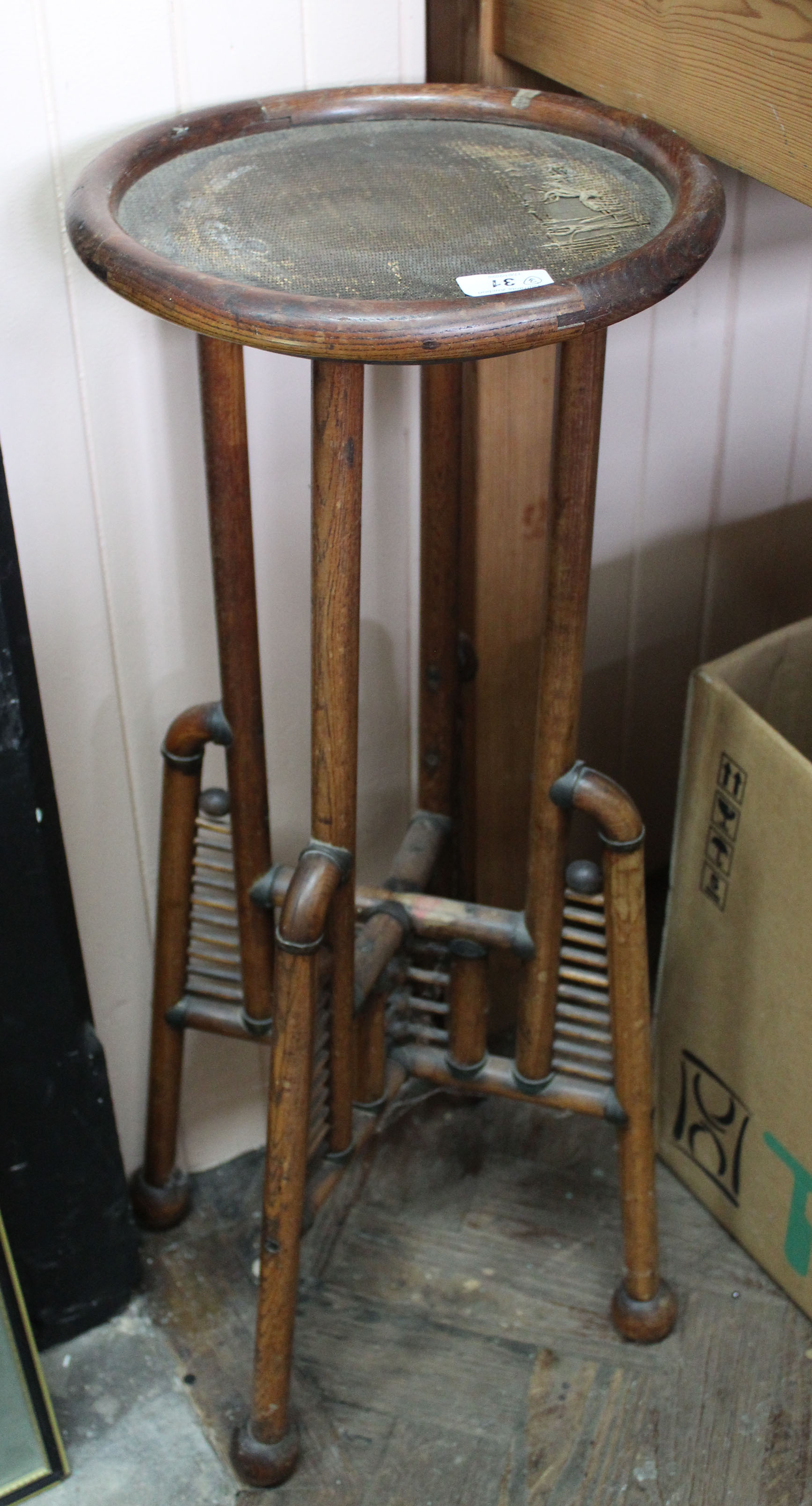 Two Royal black typewriters plus a simulated cane plant stand