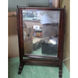 A Georgian mahogany swing toilet mirror