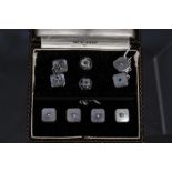 A set of 9ct gold shirt studs (in case) together with a set of silver studs and cufflinks with