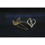 A 9ct gold diamond set heart pendant on chain