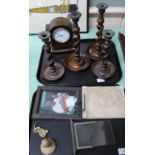 A mahogany wall mirror, oak mantel clock,