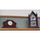 A Ansonia steeple clock plus an Edwardian inlaid mahogany clock