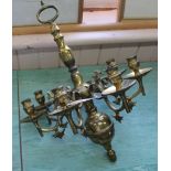 A heavy antique seven branch brass chandelier,