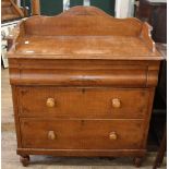 A late Victorian chest of three drawers with galleried upstand