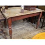 A late Victorian pine kitchen table with single drawer