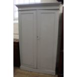 A Victorian painted pine two door linen cupboard