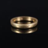 A 22ct gold wedding band,