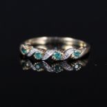 A 9ct gold emerald and diamond ring,