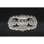 An Art Deco white metal diamond set brooch