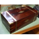 A mid 19th Century mahogany and brass bound writing box with original inkwells