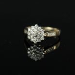 A 9ct gold diamond set cluster ring,