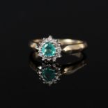 A 9ct gold heart shaped emerald and diamond ring,