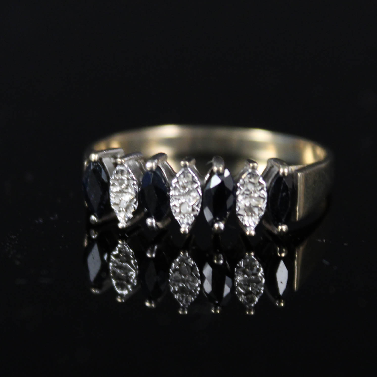 A 9ct gold sapphire and diamond ring,