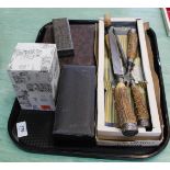 An antler handled carving set with silver ferrells, boxed pair of plated tub salts,