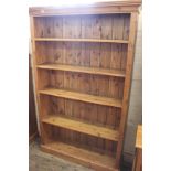 A pine tall open bookcase