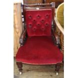 A mid 19th Century mahogany framed armchair with bobbin turnings and red velvet upholstery