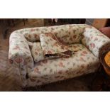 A 1920's Chesterfield two seater sofa,