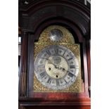 A late 18th Century eight day long case clock, the mahogany case with gilt brass mounts,