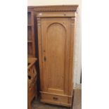 A 19th Century continental pine single door wardrobe