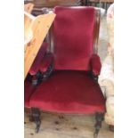 A mid 19th Century framed armchair with bobbin turnings and red velvet upholstery