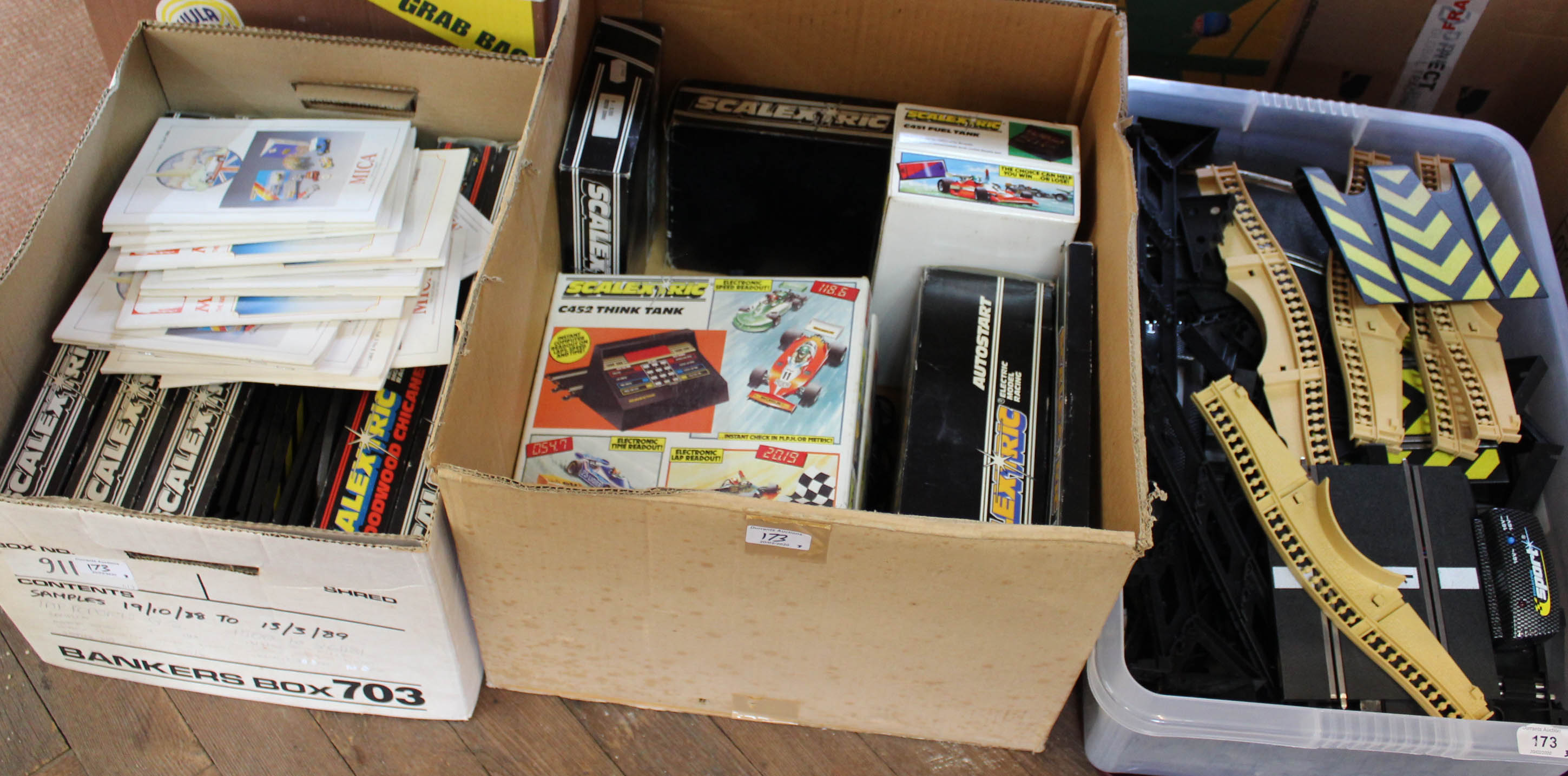 A large quantity of boxed and unboxed Scalextric track, scenery,