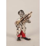 A silver enamel decorated clown with trombone (loose)